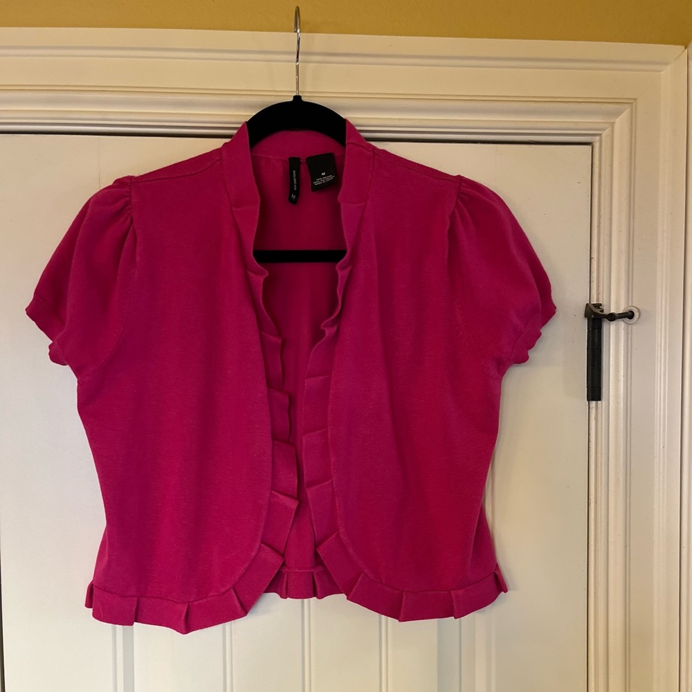 Hot pink sweater cover-up with pleated detailing